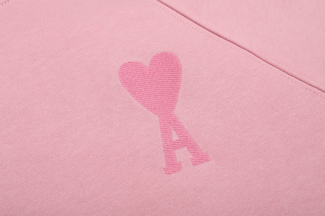 Sweat rose à petit logo ami de cœur rose