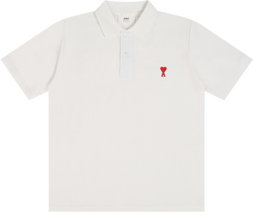 Polo blanc à petit logo ami de cœur rouge